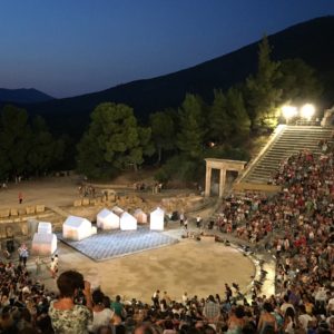 Watching a theatre play at the Ancient Epidaurus Theatre